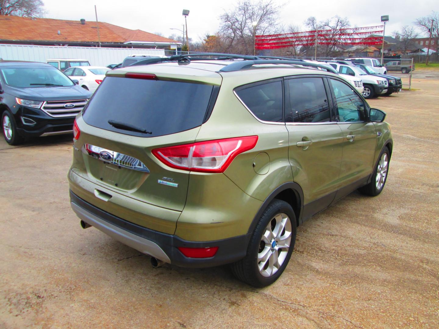 2013 GREEN Ford Escape SEL FWD (1FMCU0HX0DU) with an 1.6L L4 DOHC 16V engine, 6-Speed Automatic transmission, located at 1815 NE 28th St., Fort Worth, TX, 76106, (817) 625-6251, 32.795582, -97.333069 - Photo#4